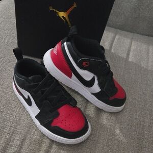 Nike Black and Red Sneakers High-Top Iconic Design
